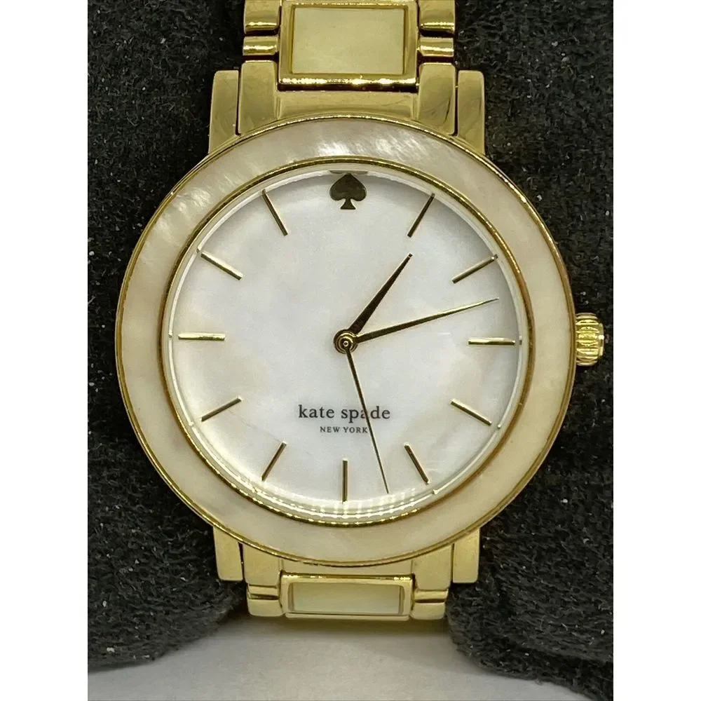 Kate Spade 0394 Womens Gold Stainless Steel Analog Dial Quartz Wrist Watch XX581